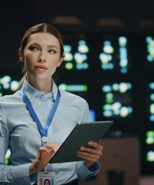 it-specialist-lady-working-tablet-computer-in-data-center-closeup-woman-at-work.jpg
